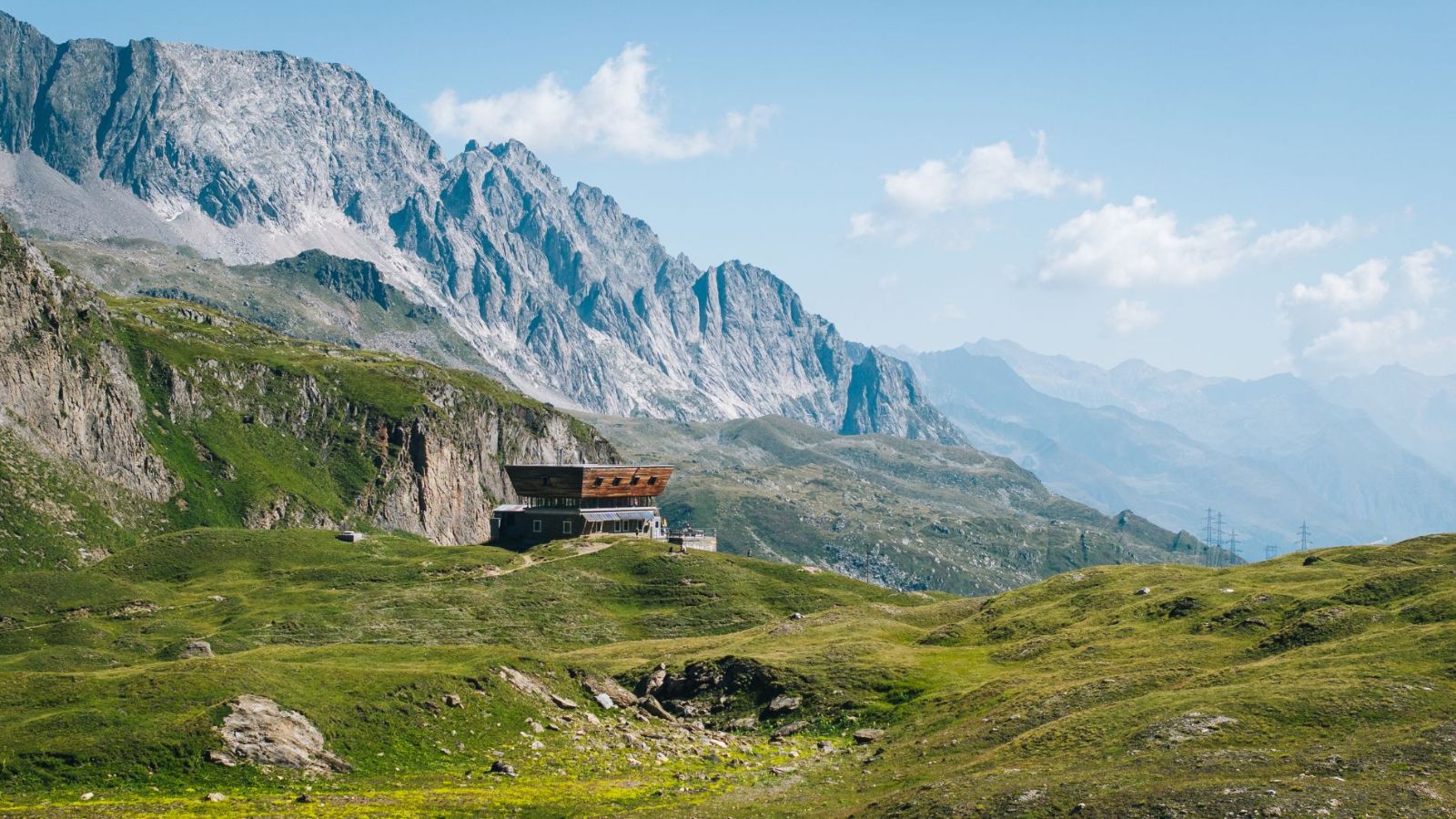 Corno Gries Hut in Bedretto Valley, among pastures and Alpine ridges